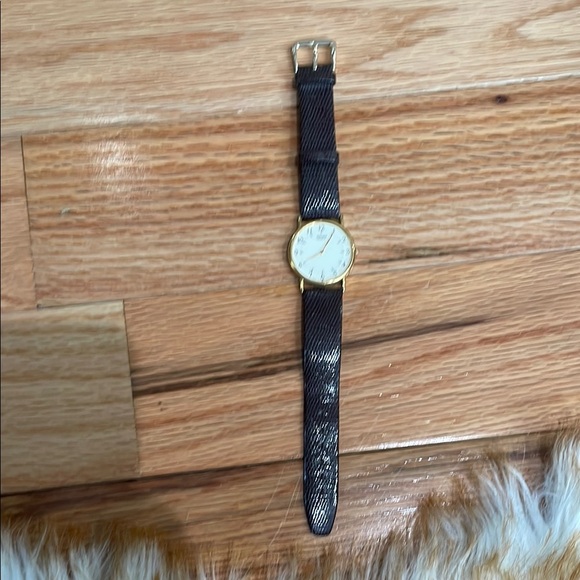 Seiko Gold Case with Black Strap Watch